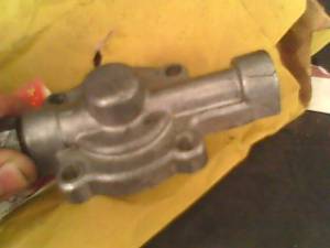 cracked_oil_pump_cover_1_by_acb2.jpg